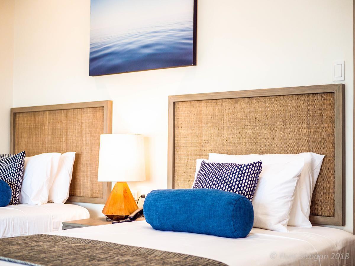 Huni Sicogon Hotel Carles Ngoại thất bức ảnh